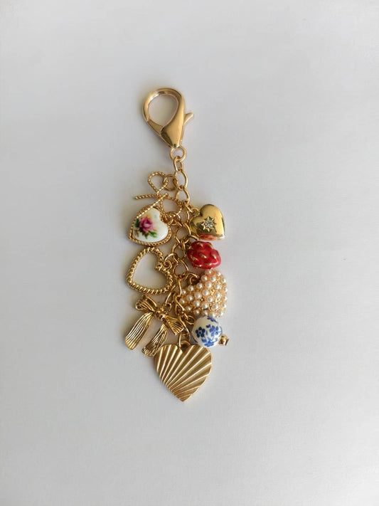 PORCELAIN BOWS BAG CHARM