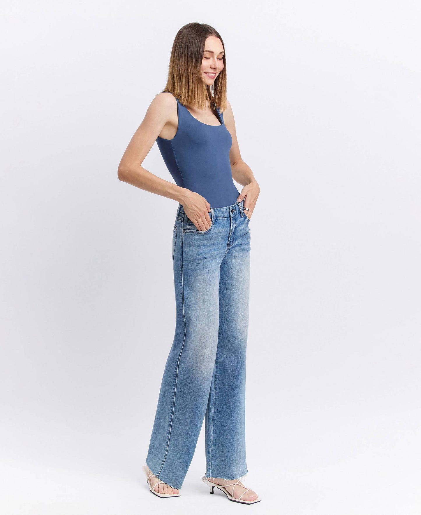 MID RISE CLEAN CUT RAW HEM WIDE JEANS
