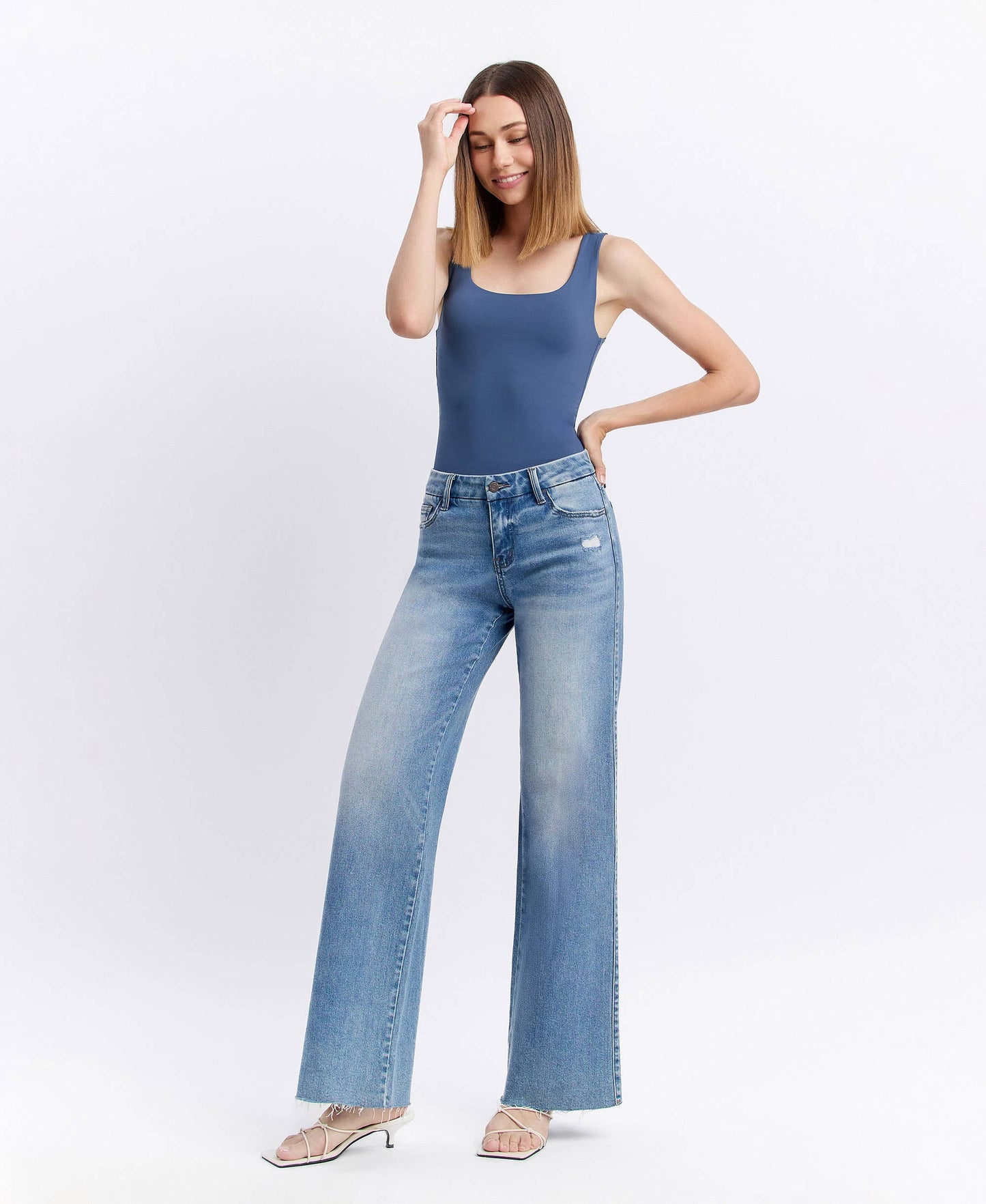 MID RISE CLEAN CUT RAW HEM WIDE JEANS